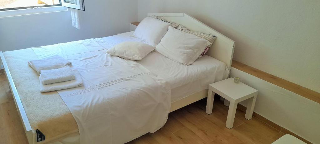 Postel nebo postele na pokoji v ubytování Apartman Bonkovic