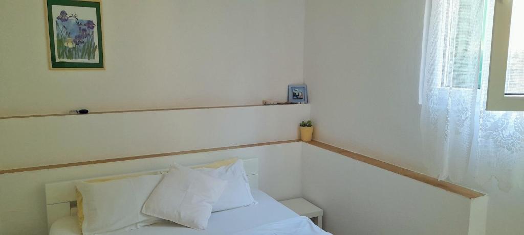 Postel nebo postele na pokoji v ubytování Apartman Bonkovic