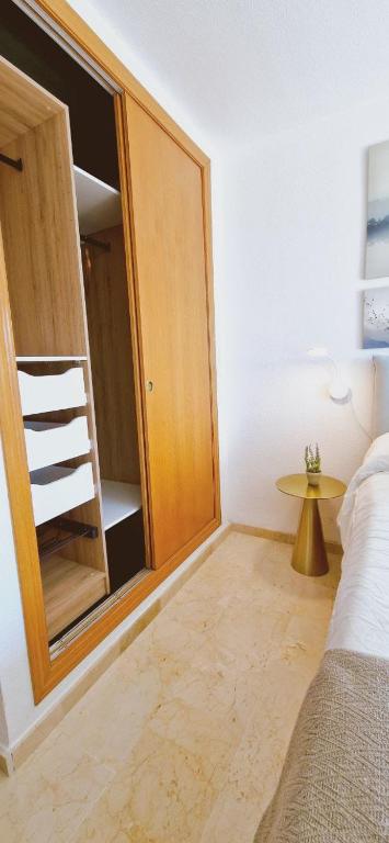 Postel nebo postele na pokoji v ubytování La Cala de Finestrat apartamento a pasos de mar!!