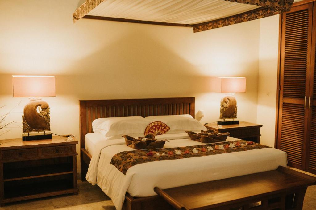 Postel nebo postele na pokoji v ubytování ALOKA BAHARI Villas