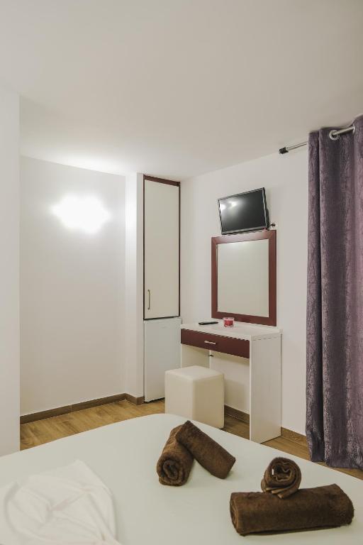 TV a/nebo společenská místnost v ubytování Fori's rooms