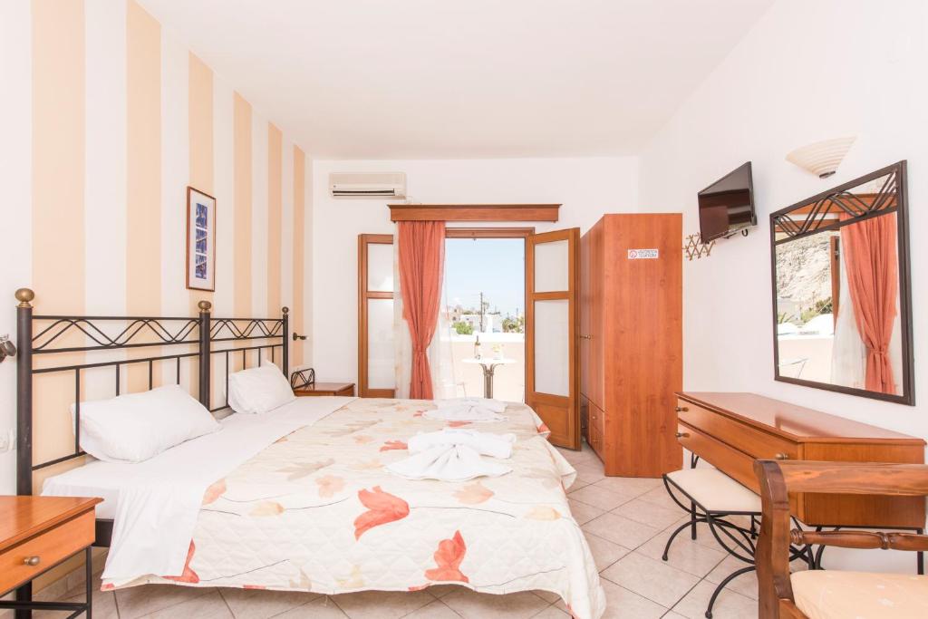 Postel nebo postele na pokoji v ubytování Villa Voula