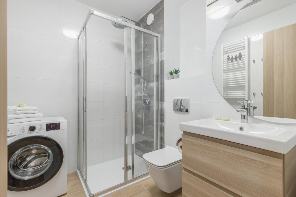 Kúpeľňa v ubytovaní Seaside Apartamenty Porta Mare I Kołobrzeg