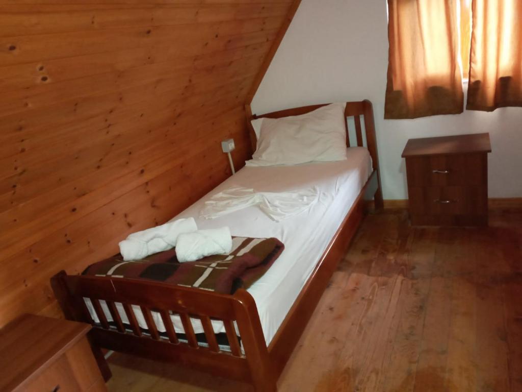 Postel nebo postele na pokoji v ubytování Guesthouse Kroni I Micanit