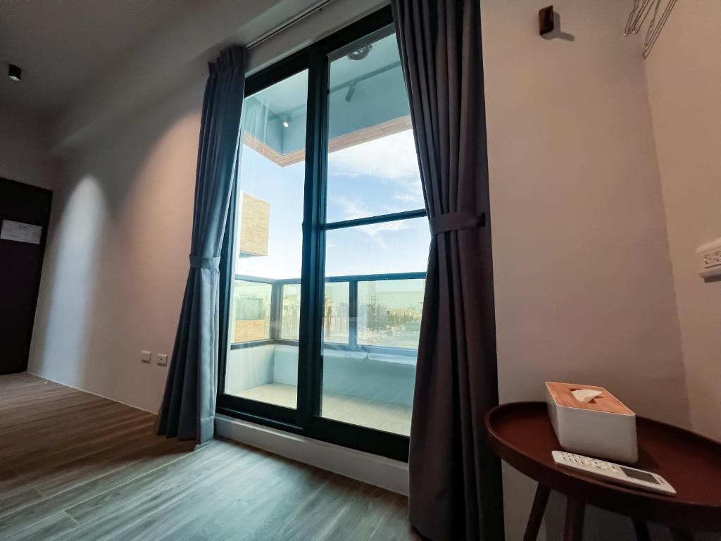 Postel nebo postele na pokoji v ubytování 漁聲民宿 FishON B&B