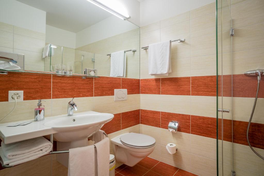 Koupelna v ubytování Hotel Unione