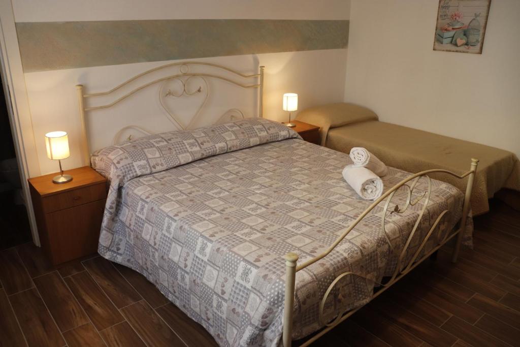 Postel nebo postele na pokoji v ubytování B&B Pastello
