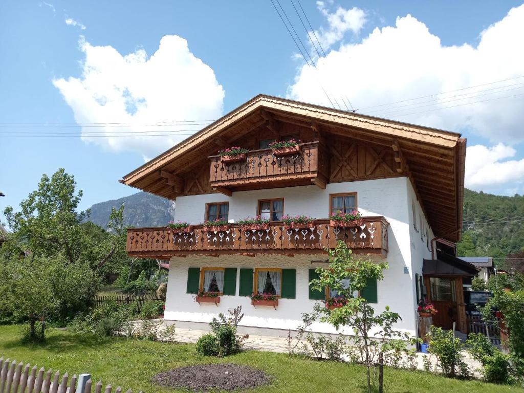 a house with a balcony on the side of it at Apartment Kramer by Interhome in Farchant