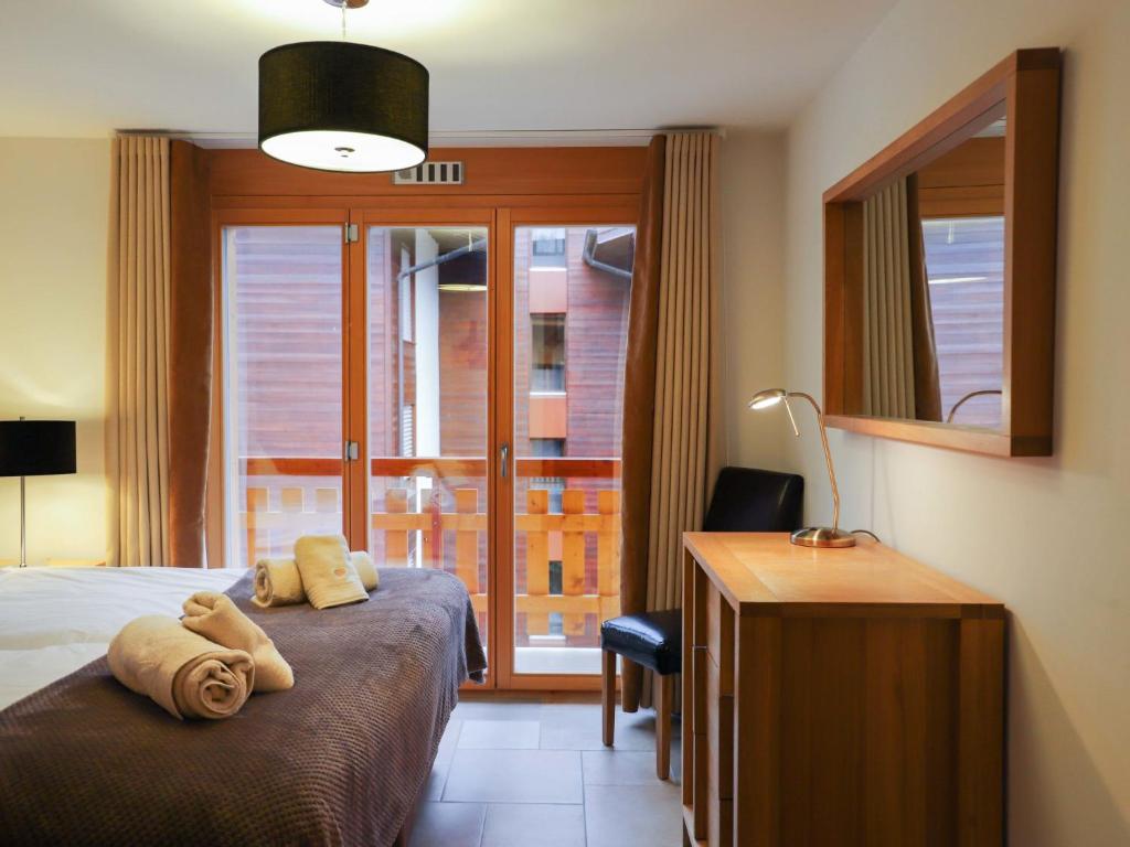 Postel nebo postele na pokoji v ubytování Apartment Cor des Alpes 16 by Interhome