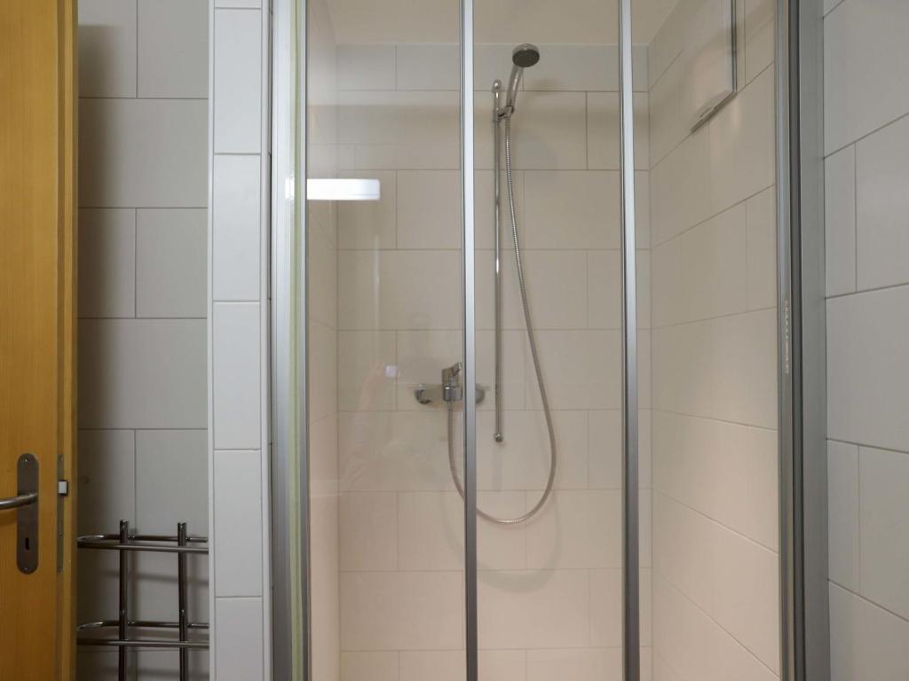 Koupelna v ubytování Apartment Cor des Alpes 16 by Interhome