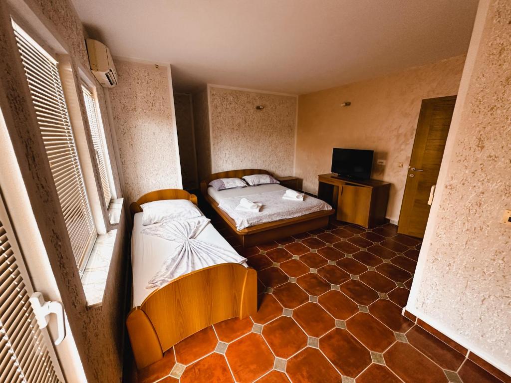 Postel nebo postele na pokoji v ubytování Apartments La Cancela