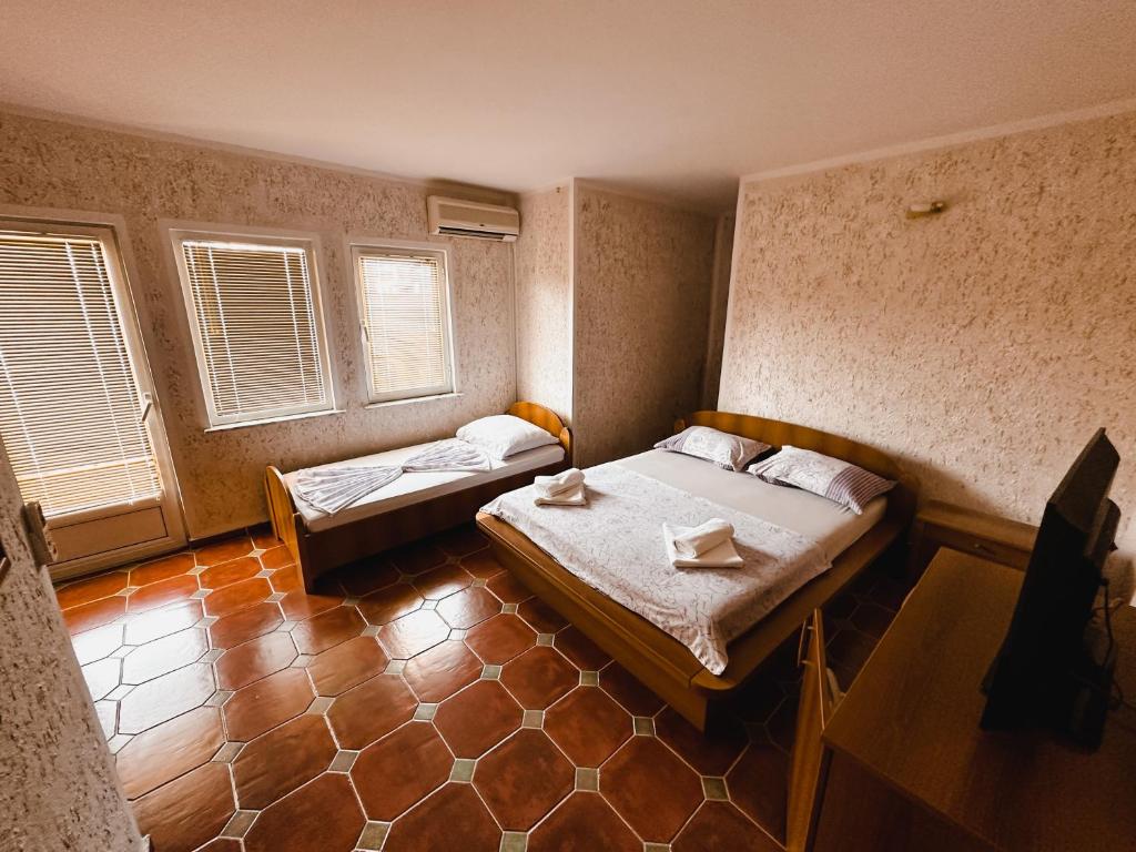 Postel nebo postele na pokoji v ubytování Apartments La Cancela