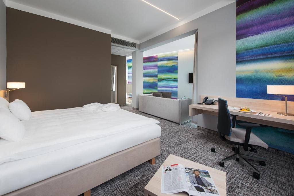 Posteľ alebo postele v izbe v ubytovaní Park Hotel & Restauracja Browar Brzeg