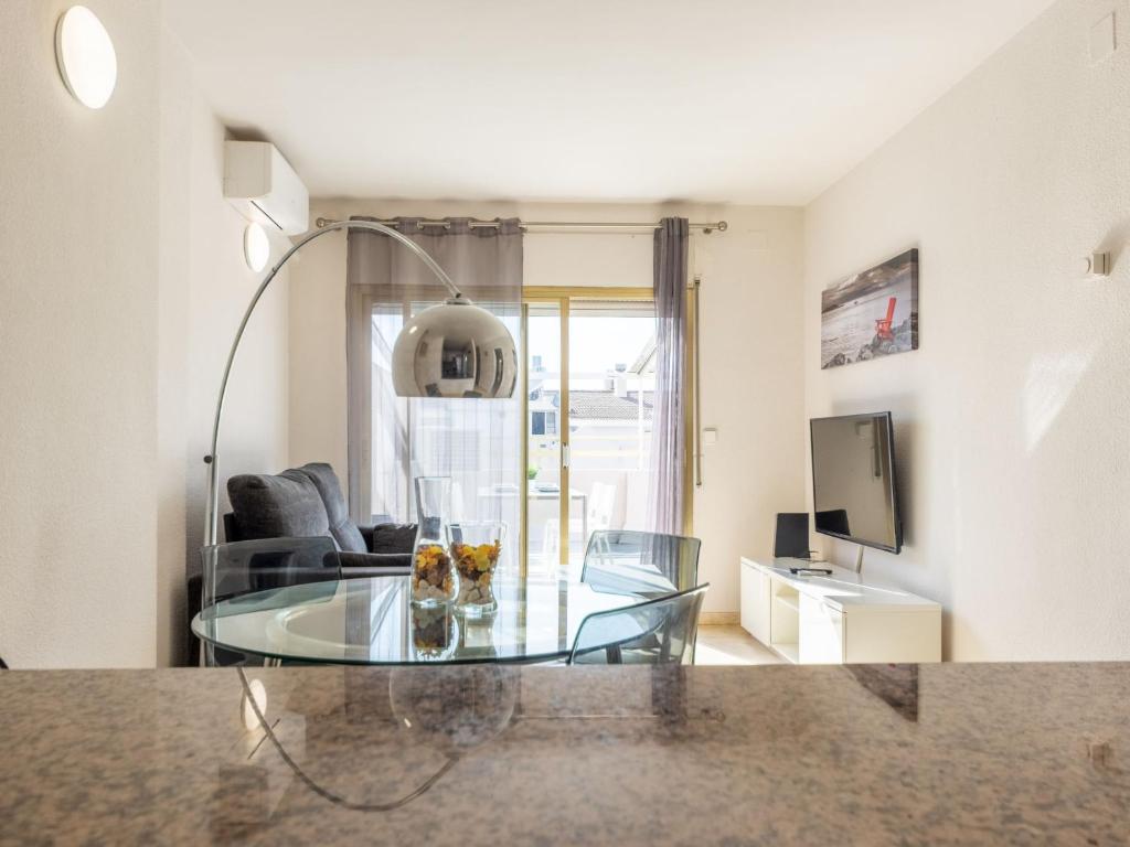 Televízia a/alebo spoločenská miestnosť v ubytovaní Apartment Michelangelo-2 by Interhome