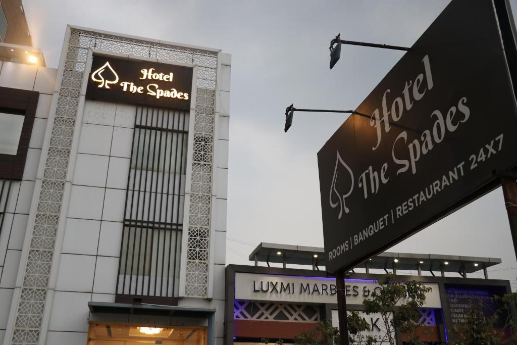 a building with a sign for a dance studio at Hotel The Spades in Zirakpur