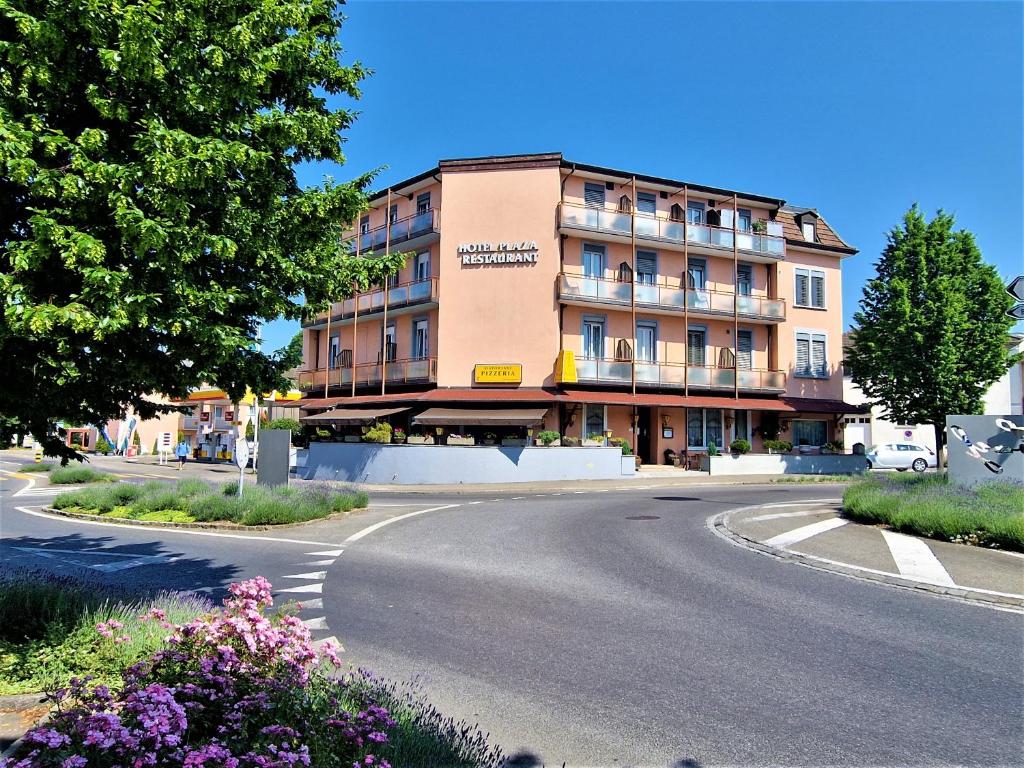 a building on the side of a road at Plaza in Kreuzlingen