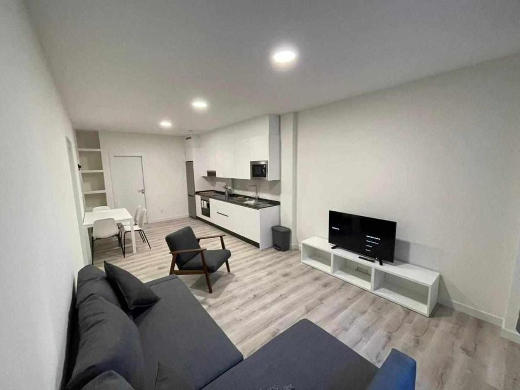 A television and/or entertainment centre at Apartamento Roncudo Planta Baja
