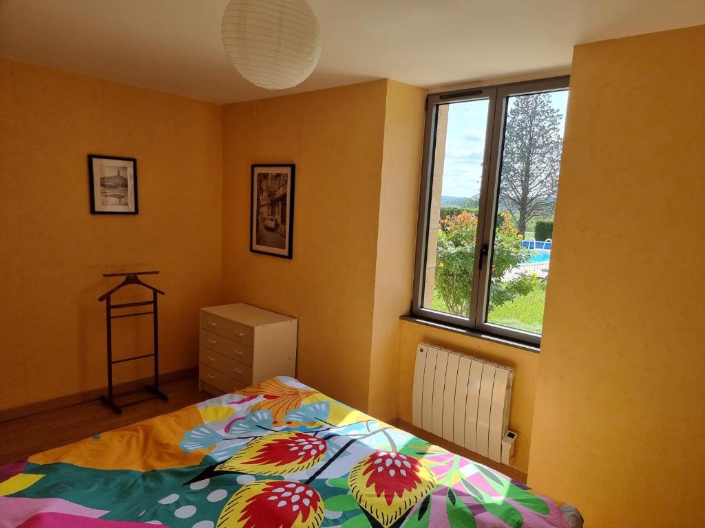 Postel nebo postele na pokoji v ubytování Mas des maries