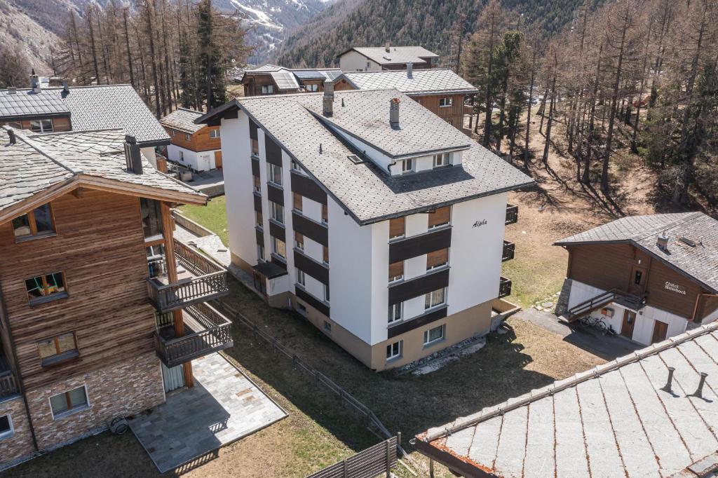 an aerial view of a building in a village at Haus Alfa in Saas-Fee