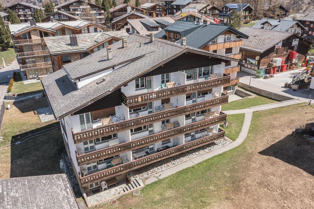 an aerial view of a building in a city at Haus Alfa in Saas-Fee
