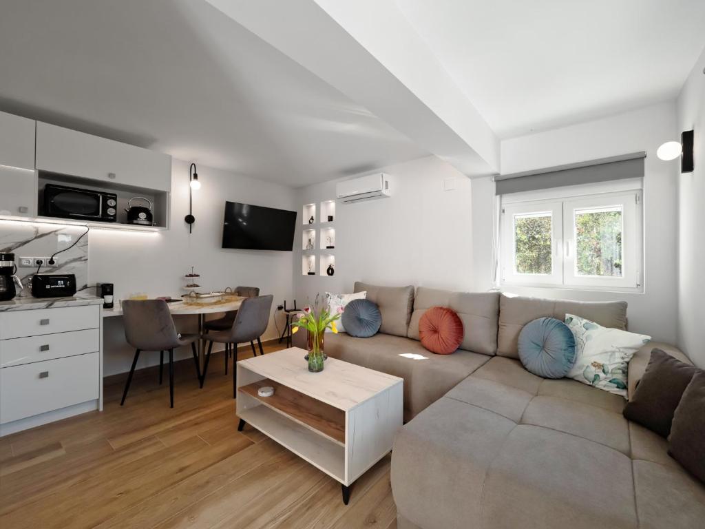 Η κουζίνα ή μικρή κουζίνα στο Olea Luxury Apartment