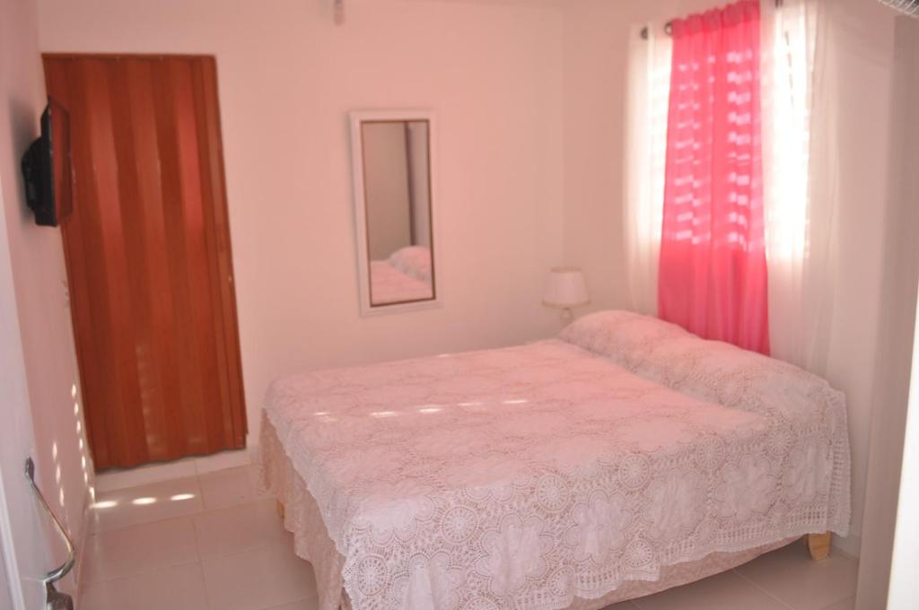 Ένα ή περισσότερα κρεβάτια σε δωμάτιο στο Residencial Lucy
