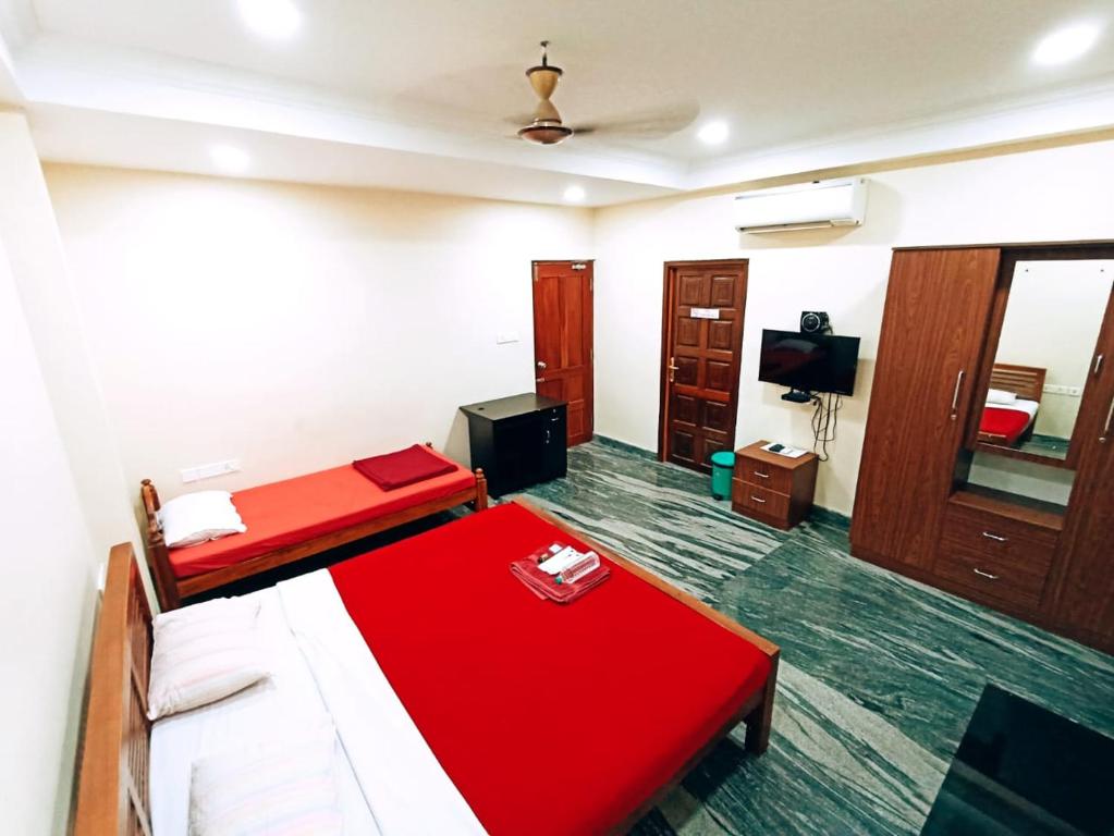 Postel nebo postele na pokoji v ubytování Metropolitan Serviced Villa