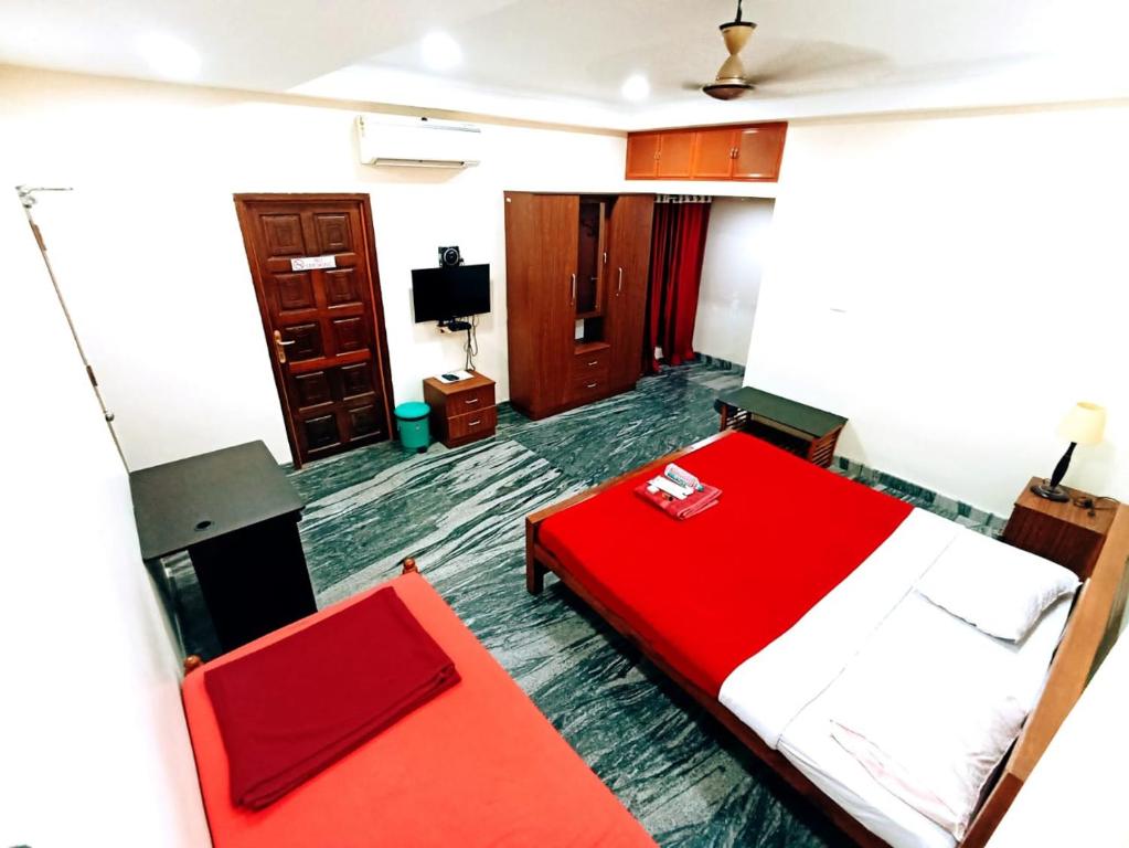 Postel nebo postele na pokoji v ubytování Metropolitan Serviced Villa