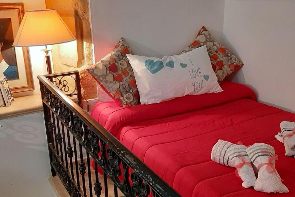 Postel nebo postele na pokoji v ubytování Cagliari Centro