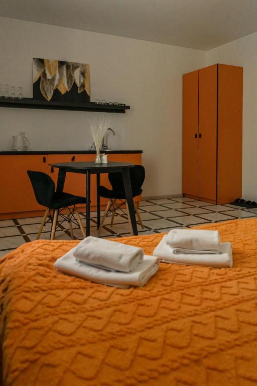 Postel nebo postele na pokoji v ubytování TREND HOUSE Apartments