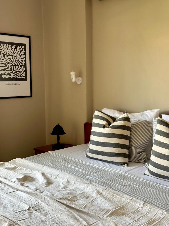 Postel nebo postele na pokoji v ubytování House No 10