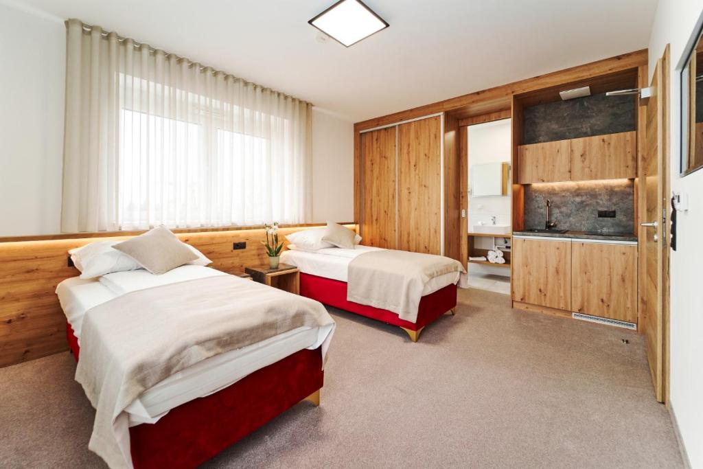 Postel nebo postele na pokoji v ubytování Medirooms Apartments