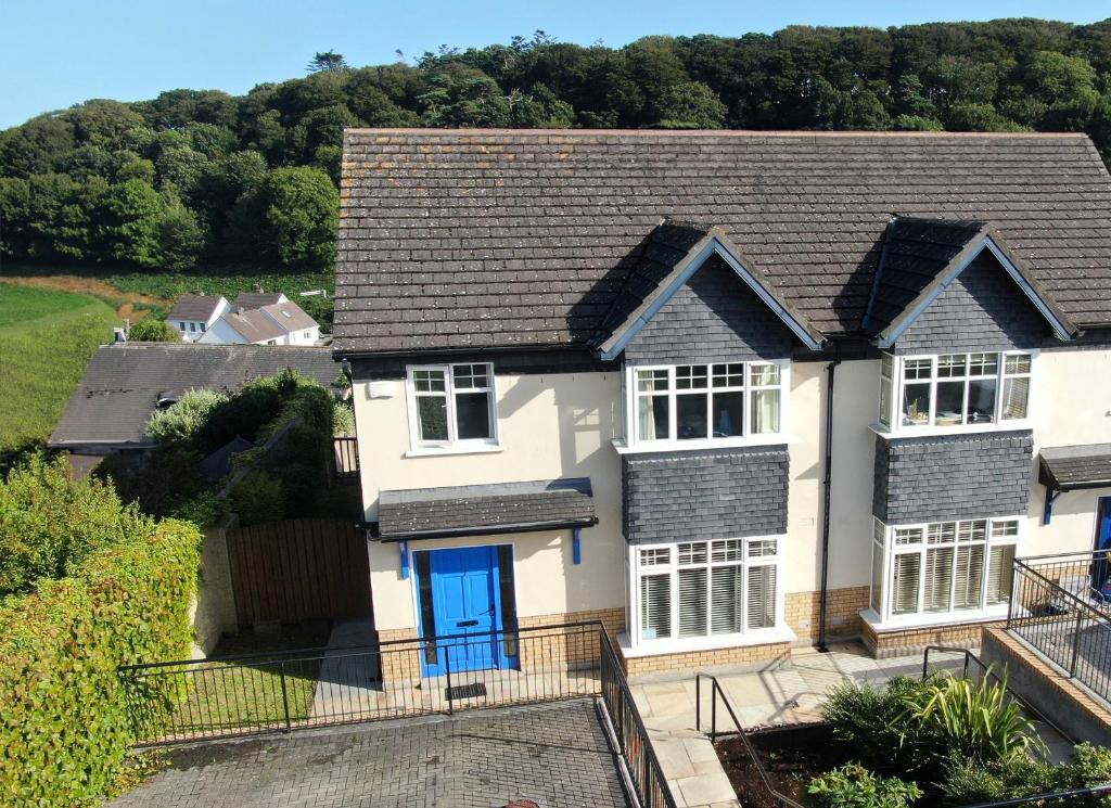 an aerial view of a house with a blue door at Glen Ard Holiday Home No 1 in Dunmore East