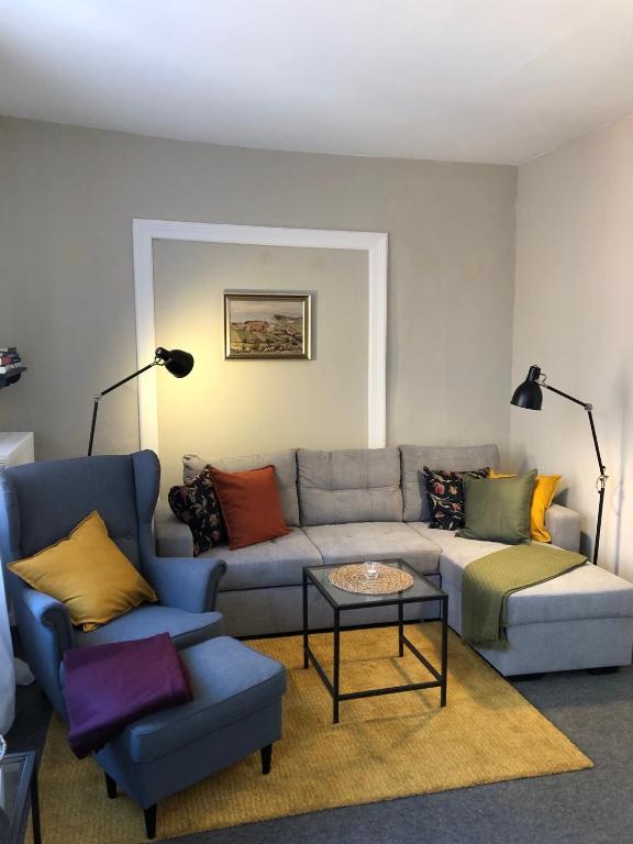 a living room with a couch and a table at In der Mühlenstraße in Malchow