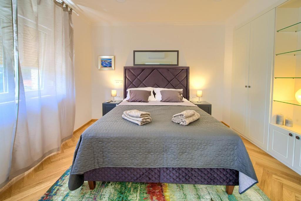 Ένα ή περισσότερα κρεβάτια σε δωμάτιο στο Apartment Paty