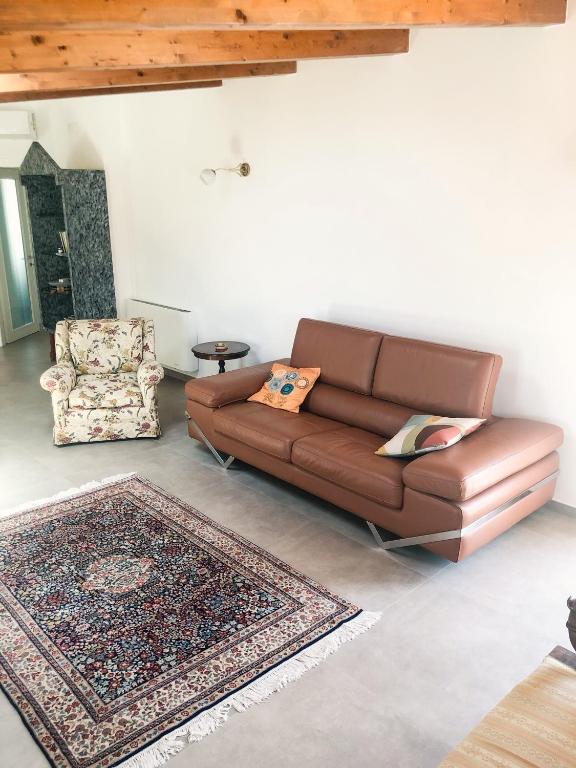 Posezení v ubytování "La casa di Ale" MODERN SUITE