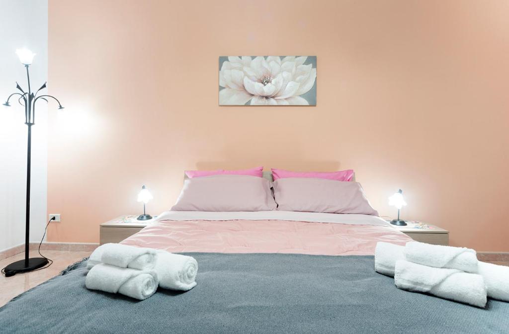 Кровать или кровати в номере Nina Home - Selfcheck-in