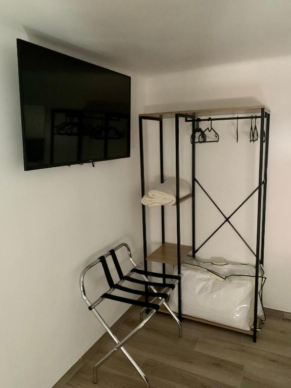 Postel nebo postele na pokoji v ubytování Visavi' Luxury Room