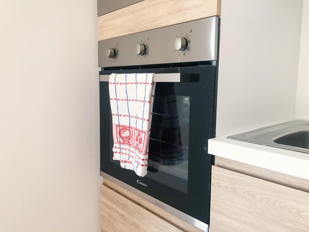 Kuchyň nebo kuchyňský kout v ubytování "La casa di Ale" MODERN SUITE