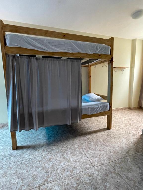 Postel nebo postele na pokoji v ubytování Wing Camp