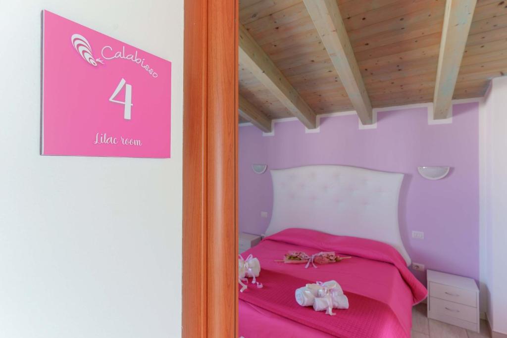 Postel nebo postele na pokoji v ubytování CalaBisso