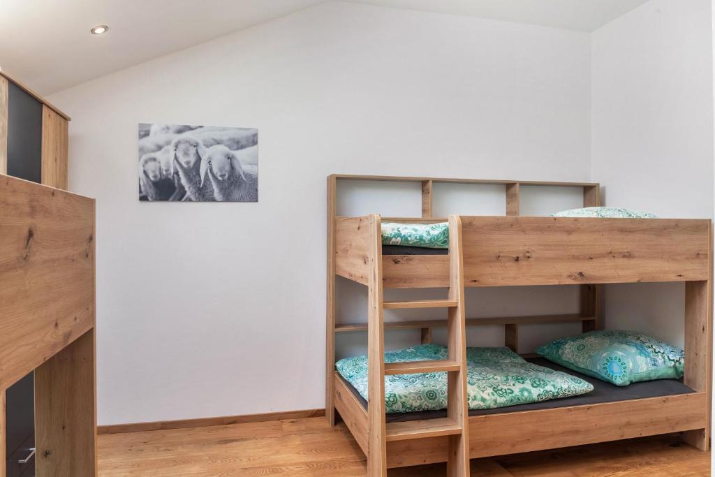 Postel nebo postele na pokoji v ubytování Ferienwohnung Vrenal