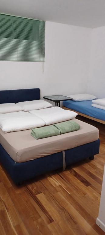 Postel nebo postele na pokoji v ubytování Como 3 B&B