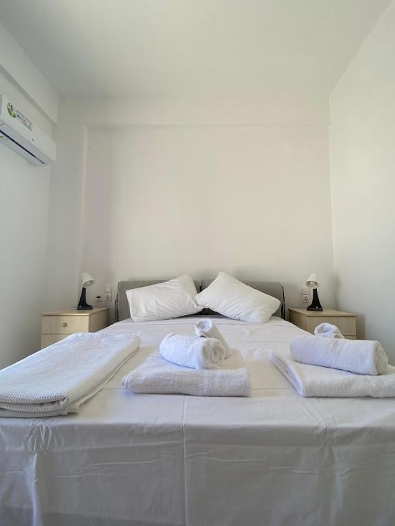 A bed or beds in a room at Males House