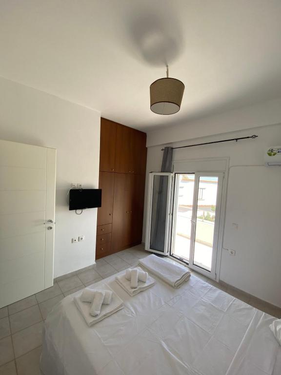 A bed or beds in a room at Males House