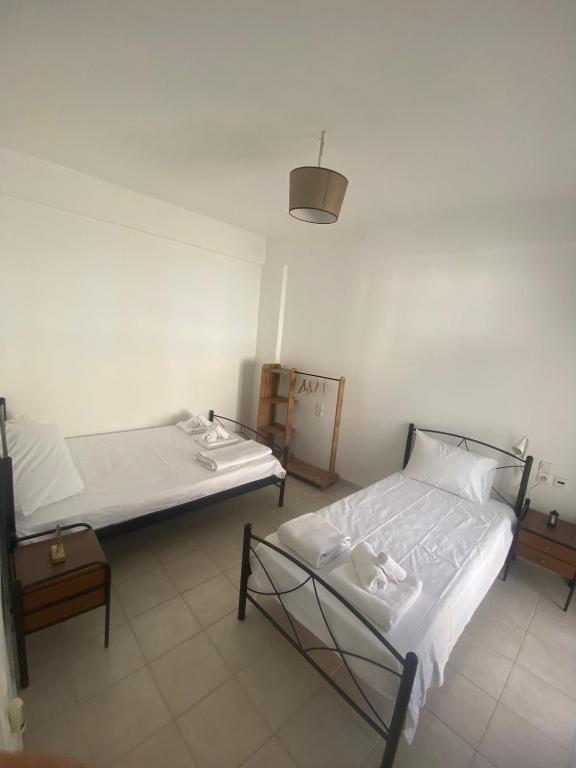 A bed or beds in a room at Males House