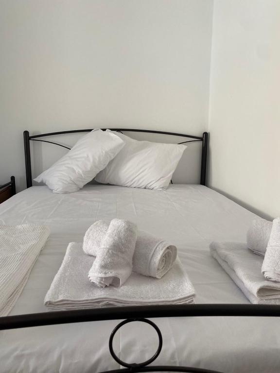 A bed or beds in a room at Males House