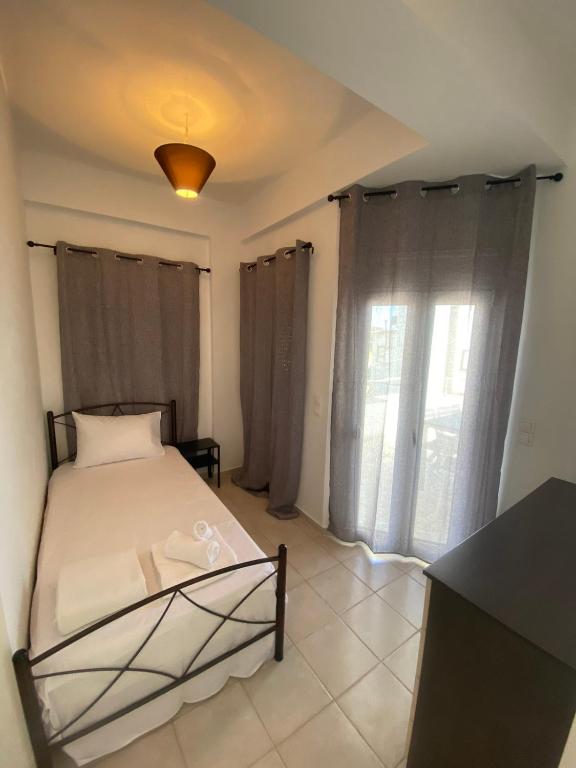 A bed or beds in a room at Males House