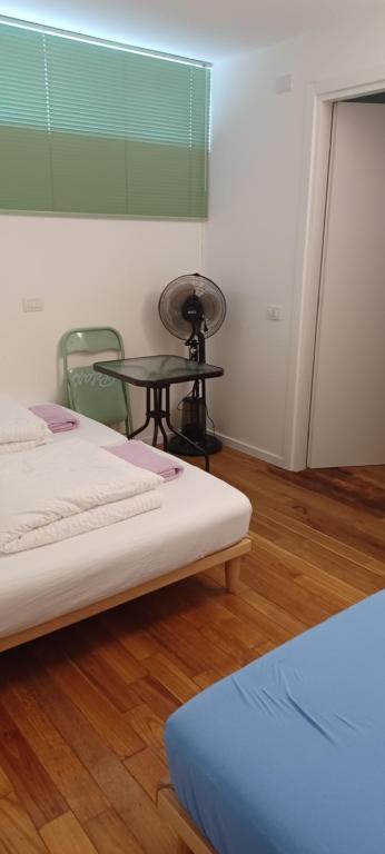Postel nebo postele na pokoji v ubytování Como 3 B&B