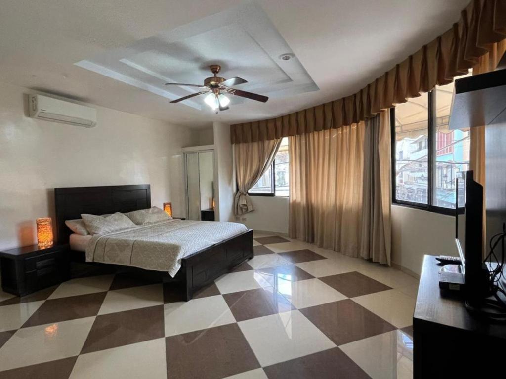 TV a/nebo společenská místnost v ubytování Aparta Hotel Roma